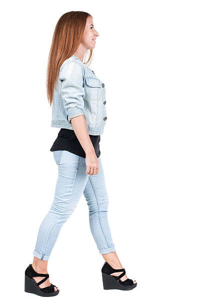 istock back view of walking  woman. 515277445