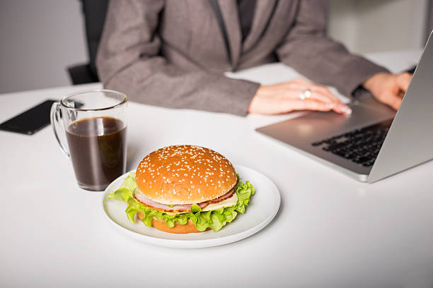 istock Unhealthy lunch at the office 515277446