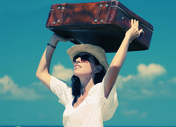 istock woman on the beach 515277499
