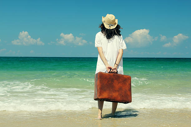 istock woman on the beach 515277567