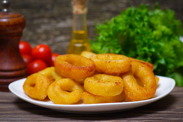 istock deep fried calamari with sauce and salad 515277846