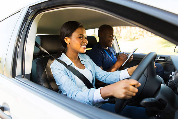 istock african woman taking driving test 515277863