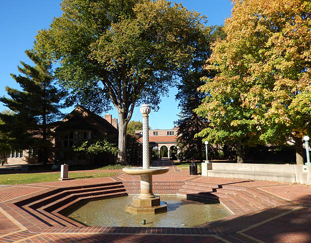 istock Brick paved plaza with fountain 515279473