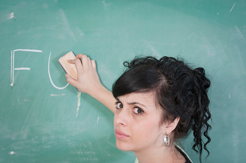 Shocked Teacher Erases Profanity from a School Blackboard