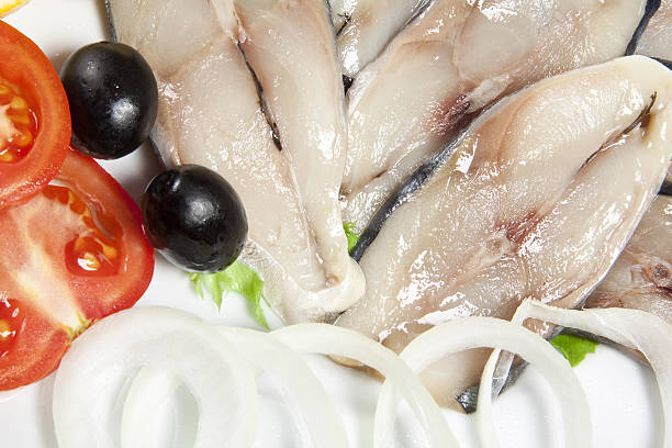 スライススモークの魚の背景 - nutritian ストックフォトと画像