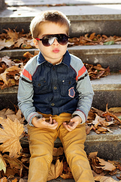 istock Little toddler boy in autumn park 515306251