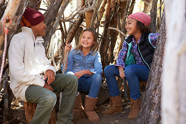 istock Group Of Children Playing In Forest Camp Together 515306488