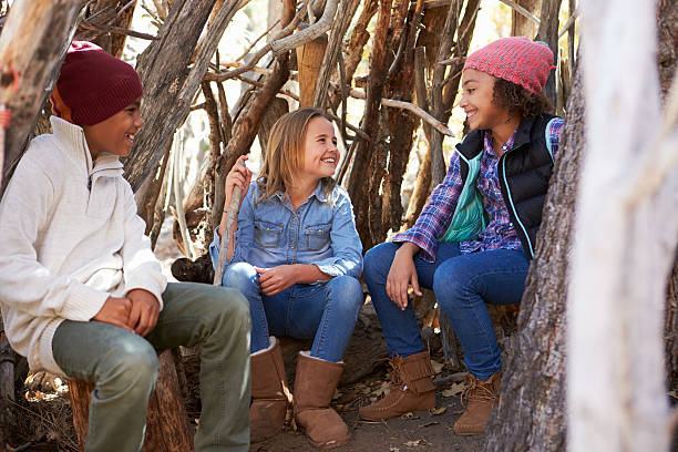istock Group Of Children Playing In Forest Camp Together 515306578