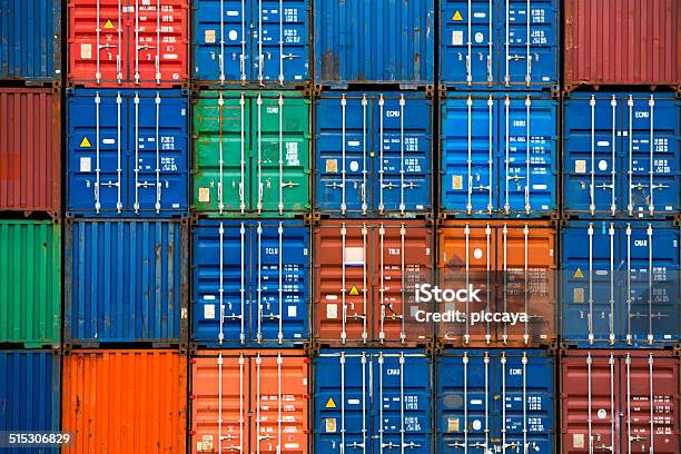 Four Vertical Rows Of Shipping Containers Stock Photo - Download Image Now - Container, Cargo Container, Commercial Dock
