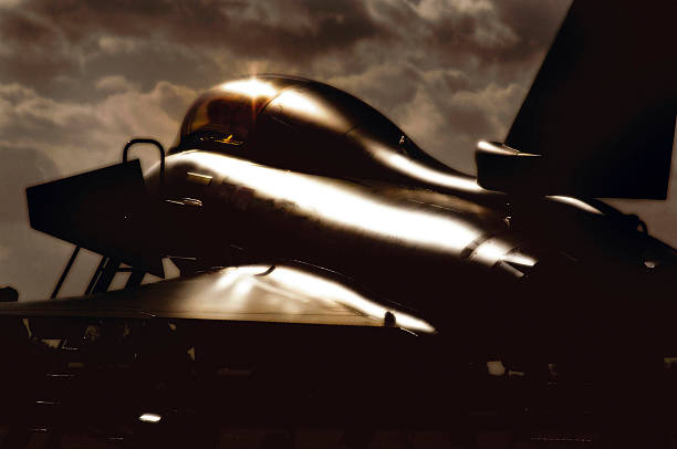 istock Royal Air Force RAF Typhoon Eurofighter, runway, dramatic stormy clouds. 515306839