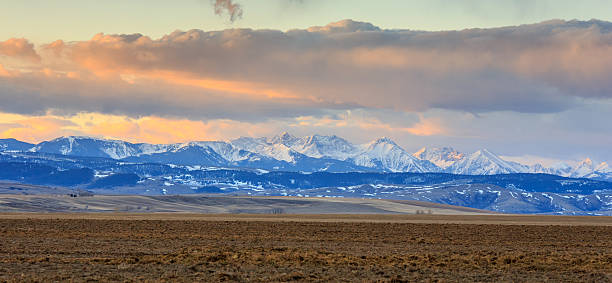 istock Farmland, Mountains, and Clouds. 515310446