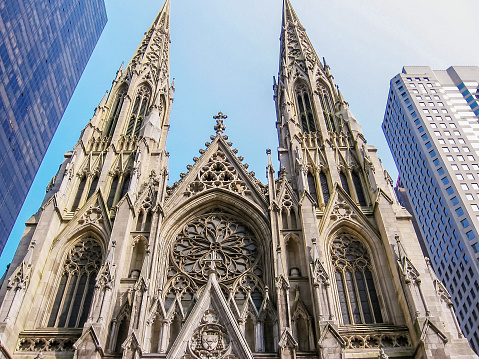St. Patricks Cathedral a Neo Gothic style Roman Catholic cathedral and a prominent landmark of midtown Manhattan, New York City. Across the street from Rockefeller Center and facing the Atlas statue.
