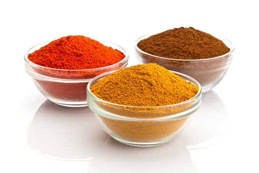 Powdered Spices on White Background.