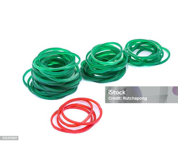 Green And Red Rubber Bands Against Isolated Stock Photo - Download Image Now - Abstract, Abundance, Circle
