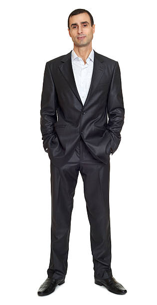 istock Man portrait in suit on white at studio 515315410