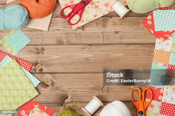 Sewing And Knitting Accessories Fabric Yarn Balls Wooden Tabl Stock Photo - Download Image Now
