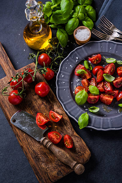 istock Simple and healthy dish, tomato and basil 515315936
