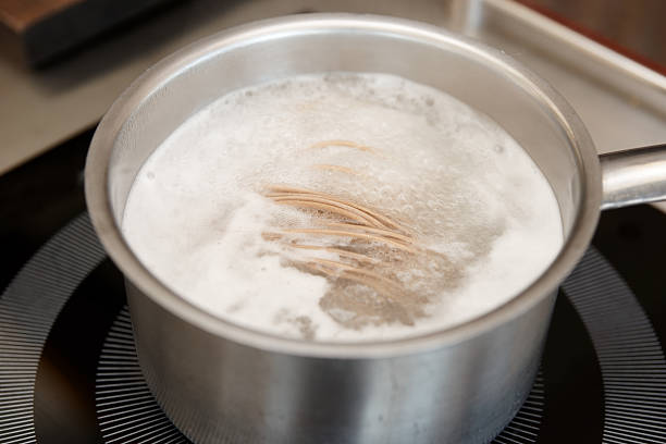 istock Noodles being cooked in boiling water 515317770