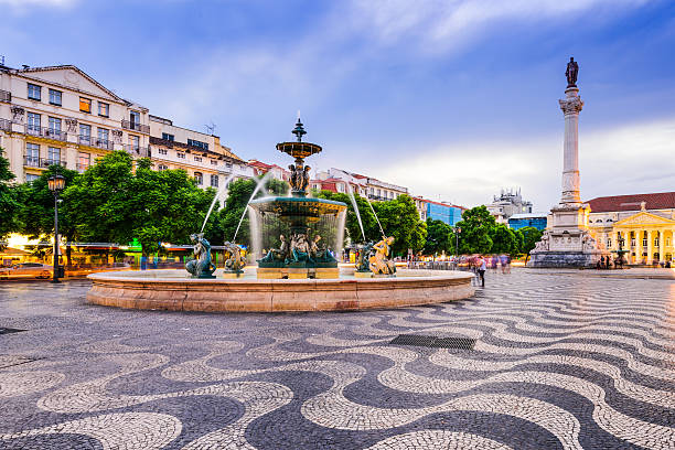 Rossio Square of Lisbon Lisbon, Portugal cityscape at Rossio Square. baixa stock pictures, royalty-free photos & images