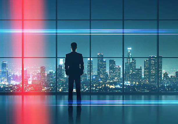 istock businessman  looking in night city 515318354
