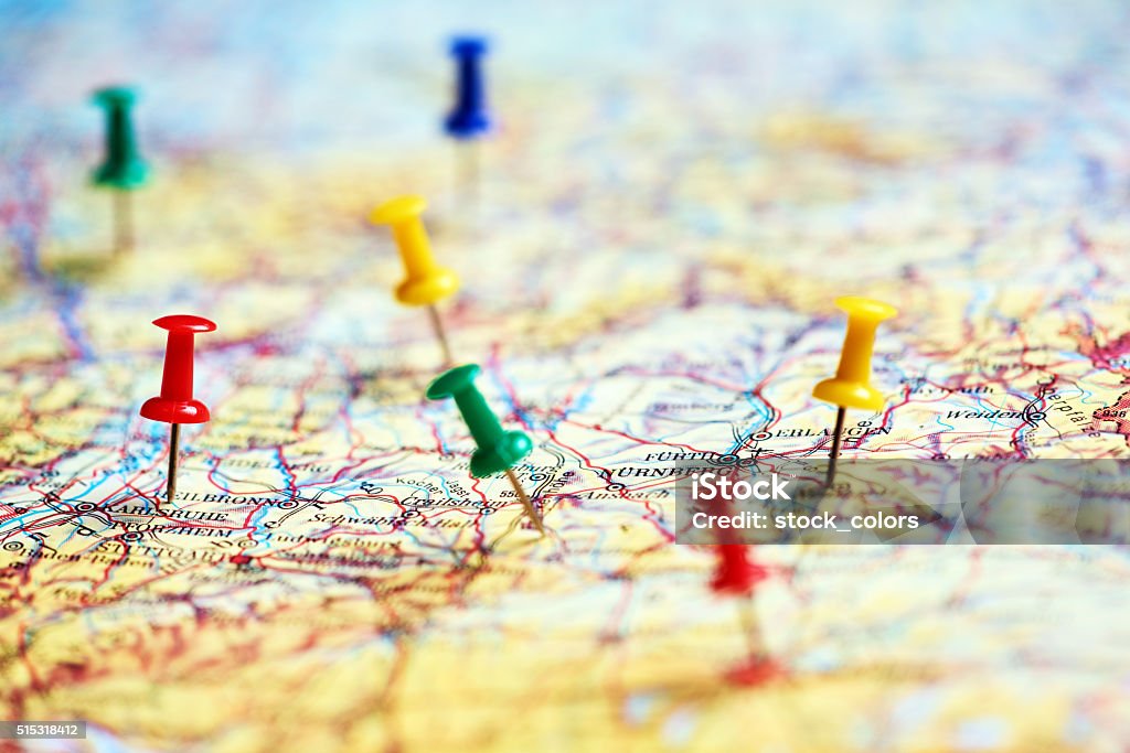 explore the world horizontal shot of colorful pins marking different destinations in Europe. Map Stock Photo