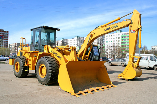Ufa, Russia - April 14, 2008: Yellow LiuGong 856 front end loader is parked in the city street.
