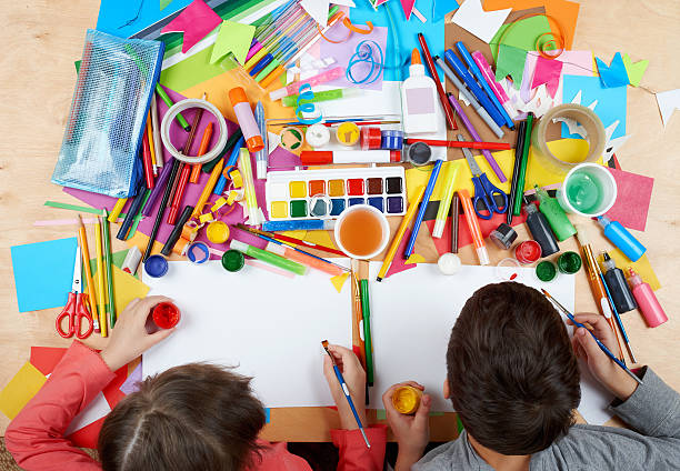 istock Child drawing top view. Artwork workplace with creative accessories. 515319466