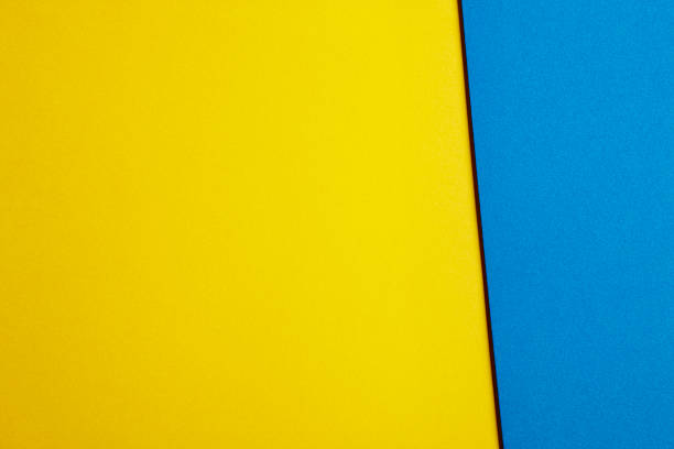 istock Colored cardboards background in yellow blue tone. Copy space 515320014