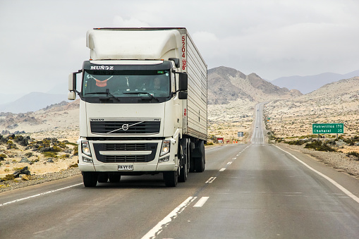Atacama, Chile - November 14, 2015: Semi-trailer truck Volvo FH12 drives at the interurban freeway.