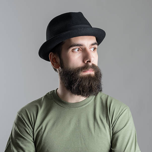 istock Serious pensive bearded man looking away 515321572
