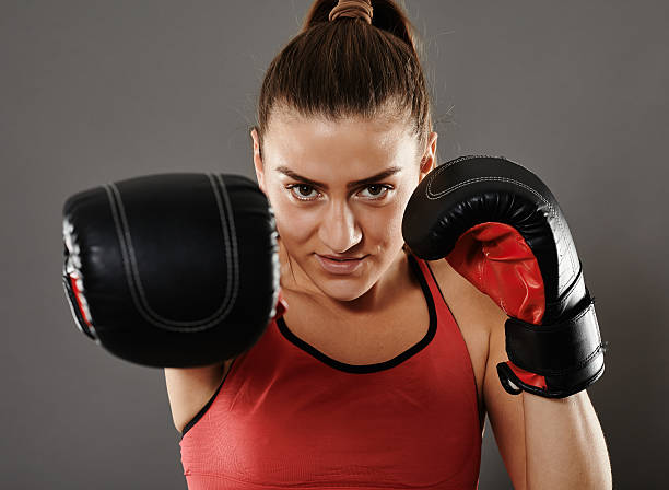 istock Kicbox woman delivering a right cross 515322084