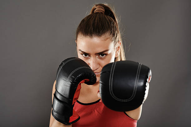 istock Kickbox woman left jab 515322272
