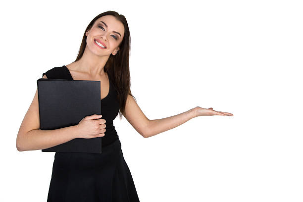 attraktive lächelnd geschäftsfrau zeigt etwas - sales clerk presentation showing women stock-fotos und bilder