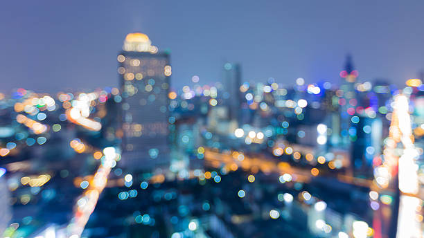 istock Night view blurred light bokeh, city downtown background 515366396