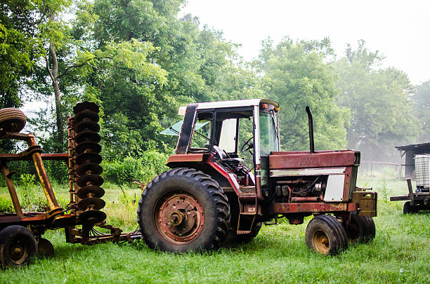 istock Red tractor on a foggy morning 515366904