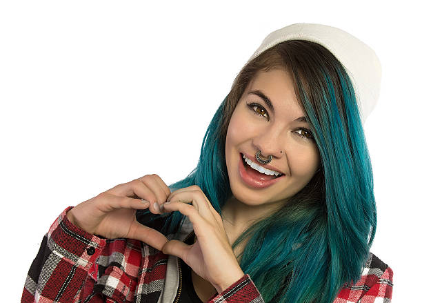 istock Beautiful hipster girl smiling while gesturing the heart sign 515368536