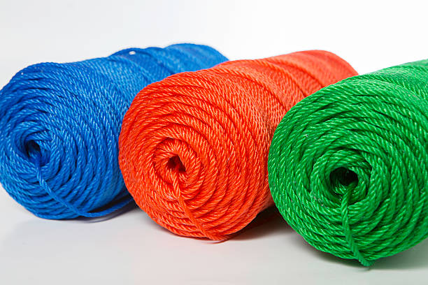 istock Rolls of green, blue and red polyester rope 515372634