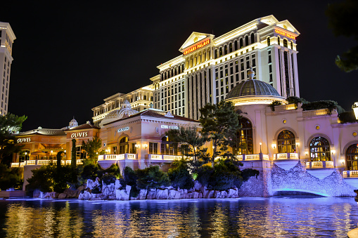 Las Vegas, Nevada, USA - September 22, 2015: Night time view of the neon illuminations of Caesars Casino in Nevada. 