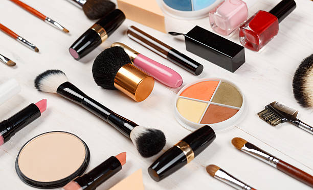 istock Various makeup products on wooden background 515373342