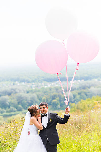 istock summer holidays, celebration and wedding concept - couple with colorful 515373782