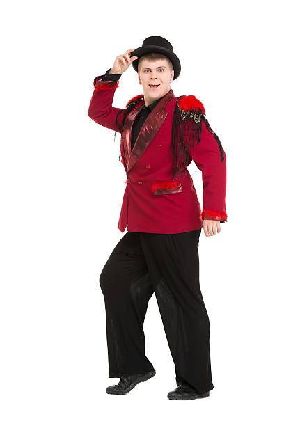 istock Emotional Entertainer in Red Suit and Silk Hat 515374358