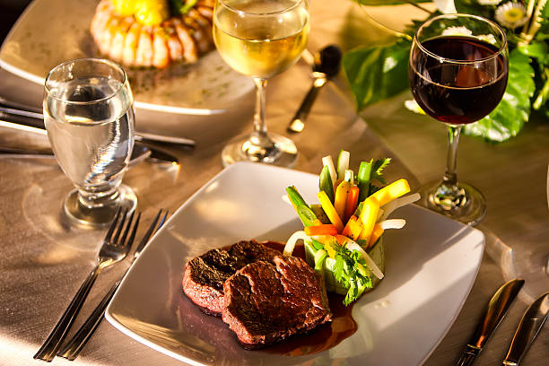 istock Juicy beef and wine glasses. 515374384