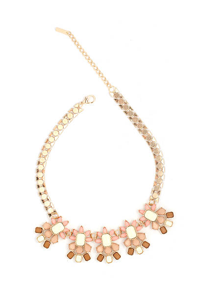 istock gold necklace with pink stones isolated on white 515376870