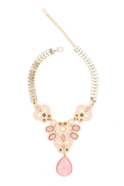 istock gold necklace with pink stones isolated on white 515376920