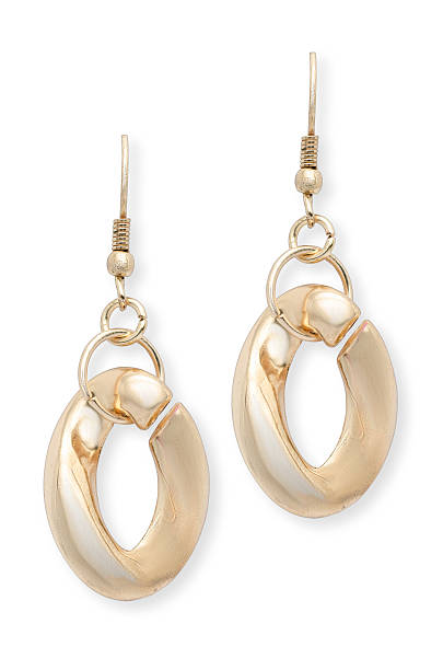 istock gold earrings isolated on white 515379052