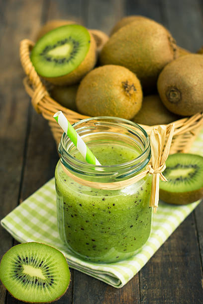 istock Fresh kiwi smoothie and fruit on the table 515379506