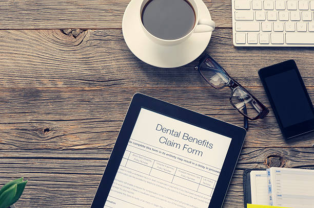 istock Online dental health benefits claim form. 515379862