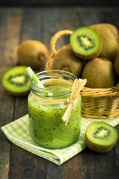 istock Fresh kiwi smoothie and fruit on the table 515380118