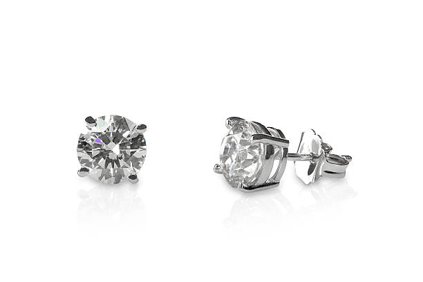 美しいダイヤモンドのスタッズイヤリング - jewelry gem gold reflection ストックフォトと画像