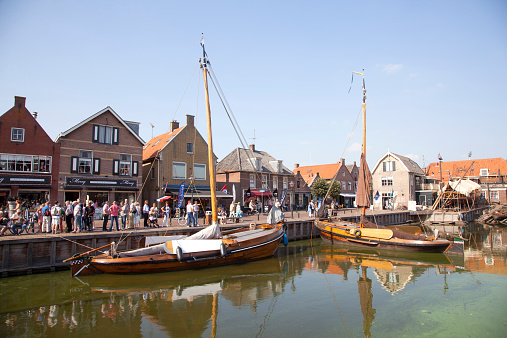 old dutch sailing vessels in the harbor of Spakenburg in the Netherlands